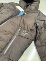 C.P. COMPANY 006A METROPOLIS PERTEX HOODED DOWN JACKET IN RUM & RAISEN - Image 7