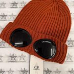 CP Company Chunky Goggle Beanie In Pumpkin Orange.