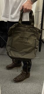 CP Company Chrome-R Tote Backpack in Green 

Rrp £255 

Large and versatile bag from C.P. Company in their nylon based Chrome-R material with tote straps and adjustable padded straps. The tote bag/backpack also features a large zipped main compartment with an inner zip sleeve, zipped front pocket, two side pouches with drawcord closure and a tonal C.P. Company logo embroidered on the front. 

100% Nylon
Water Resistant
Tote Handles
Padded Adjustable Shoulder Straps
Large Main Zip Compartment
Inner Zipped Sleeve
Drawcord Adjustable Side Pouches
Front Zipped Pocket
Certi cut 
Tonal Logo Embroidery To Front
Approx 17” x 18” 

£120 

6 available Copy - Image 8