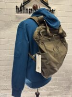 CP Company Chrome-R Tote Backpack in Green 

Rrp £255 

Large and versatile bag from C.P. Company in their nylon based Chrome-R material with tote straps and adjustable padded straps. The tote bag/backpack also features a large zipped main compartment with an inner zip sleeve, zipped front pocket, two side pouches with drawcord closure and a tonal C.P. Company logo embroidered on the front. 

100% Nylon
Water Resistant
Tote Handles
Padded Adjustable Shoulder Straps
Large Main Zip Compartment
Inner Zipped Sleeve
Drawcord Adjustable Side Pouches
Front Zipped Pocket
Certi cut 
Tonal Logo Embroidery To Front
Approx 17” x 18” 

£120 

6 available Copy - Image 10