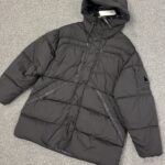 C.P. COMPANY 173A GARMENT DYED 'NYCRA-R”DOWN LENS HOODED JACKET IN BLACK    -   XL / P2P  26”