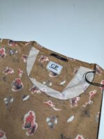 CP company 281A tacting piquet T-shirt in all Over sponged print - Pastry Shell Orange - Image 3