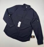 CP COMPANY 299A WOOL GABARDINE SHIRT IN NAVY.