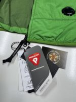 CP COMPANY G.D.P POLARTEC LENS GILET VEST IN CLASSIC GREEN. - Image 3