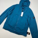 Cp Company 014A Flatt Nylon Reversible Hooded Lens Jacket in blue