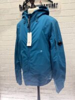 Cp Company 014A Flatt Nylon Reversible Hooded Lens Jacket in blue - Image 7