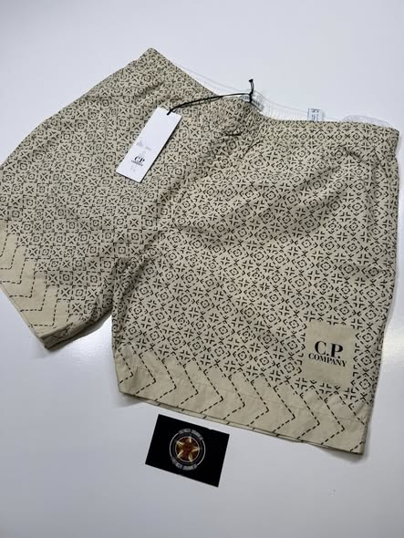 712603907_922528064208838_1865264767661904117_n C.P. Company flatt Nylon baja-print shorts - Pistachio - Image 1