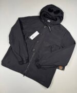 CP COMPANY 018A FLATT NYLON GOGGLE OVERSHIRT IN BLACK