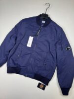AW26/27   C.P. COMPANY 081A T-FLATT NYLON PADDED BOMBER JACKET IN NAVY  - Large / P2P  23.5”