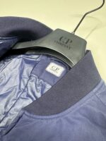 AW26/27   C.P. COMPANY 081A T-FLATT NYLON PADDED BOMBER JACKET IN NAVY  - Large / P2P  23.5” - Image 4