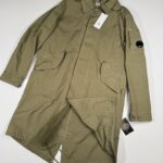 CP COMPANY 069A TWILL LONG PARKA LENS JACKET IN VINTAGE KHAKI -    Large / P2P 24”