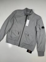 CP COMPANY 010A PRO-TEK LENS JACKET IN GREY  -     Size 52 / XL / p2p 24”
