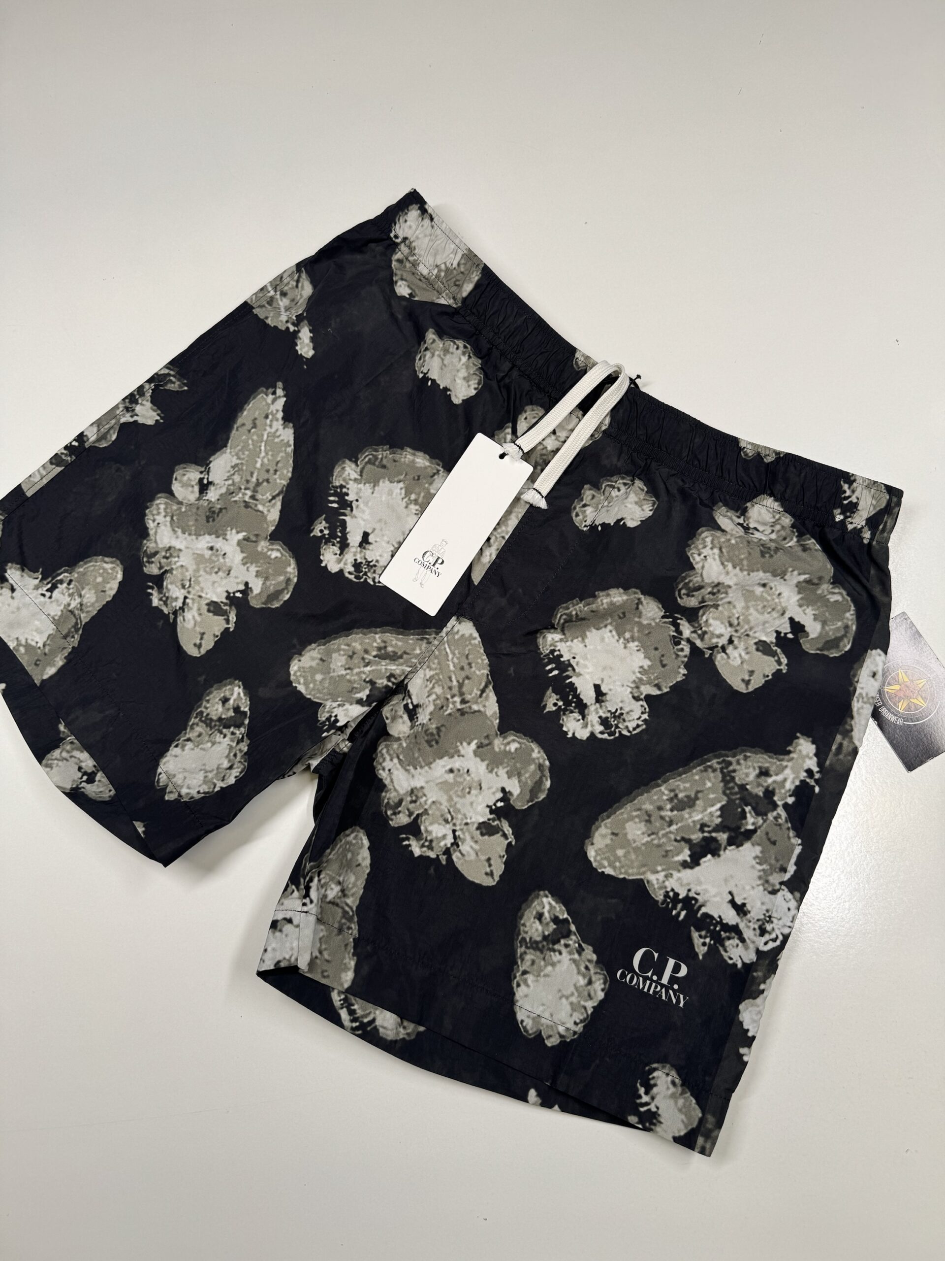 img_4726-2 C.P. Company 314A flatt Nylon flower print shorts in Black - Image 1