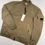 C.P. COMPANY 182A  NYCRA-R BOMBER JACKET IN VINTAGE KHAKI