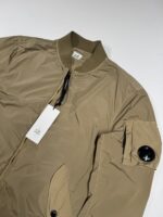 C.P. COMPANY 182A  NYCRA-R BOMBER JACKET IN VINTAGE KHAKI - Image 2