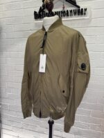 C.P. COMPANY 182A  NYCRA-R BOMBER JACKET IN VINTAGE KHAKI - Image 10