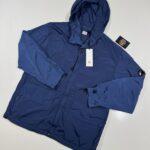 C.P. COMPANY 181A NYCRA-R HOODED JACKET IN OCEANA BLUE  -   Large / P2P 24”.
