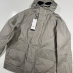 CP Company 217A waterproof goggle jacket in toob two - Vintage khaki / 327
