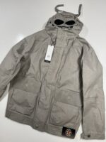CP Company 217A waterproof goggle jacket in toob two - Vintage khaki / 327