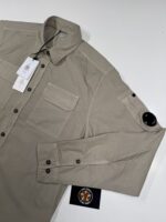 CP COMPANY 140A ORGANIC GABARDINE BUTTONED SHIRT IN VINTAGE KHAKI - Image 2