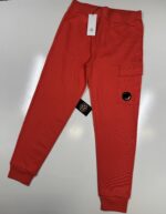 CP COMPANY 017A DIAGONAL RAISED FLEECE JOGGING PANTS IN CORAL  / 547  -   Medium / w32”. - Image 4