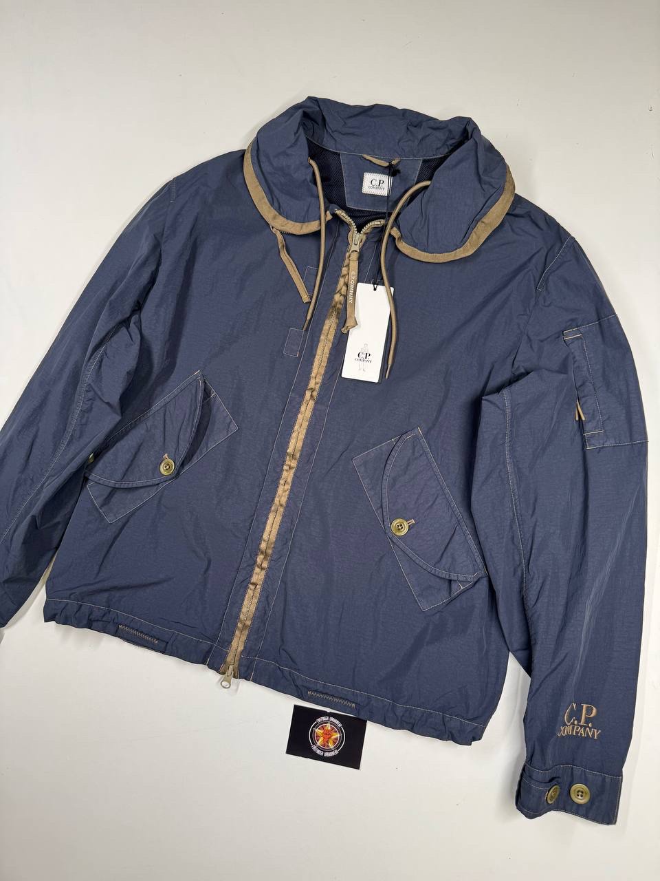 img_0351-2 CP Company 297A Flatt Nylon Cuff Logo Jacket in India ink blue - Large / P2P 22.5” - Image 1