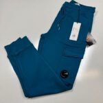 CP Company 100A Cotton  Diagonal Fleece Lens pocket sweatpants  in Petrol Blue  -   XS./ w29”