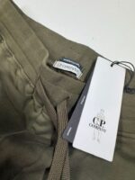 CP COMPANY METROPOLIS 034A STRETCH FLEECE MIXED JOGGING PANTS IN GREEN  • Medium / W32” - Image 4