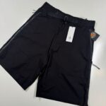 CP COMPANY METROPOLIS 010A HYST BERMUDA CARGO SHORTS IN BLACK